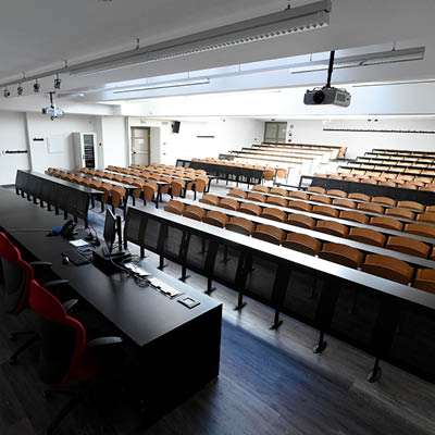 lecture theatre with rows of desks