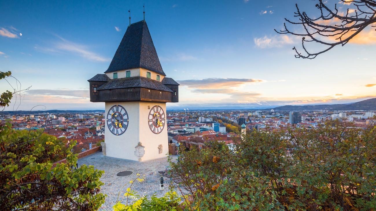 Graz clock tower at sunset, Graz, Styria, Austria